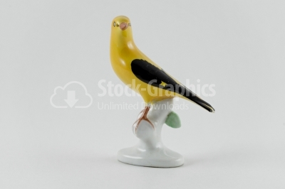 Yellow bird porcelain statue
