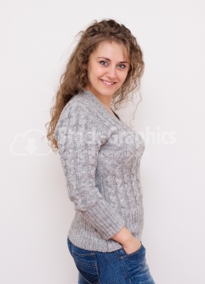 Young beautiful woman with long curly hairs
