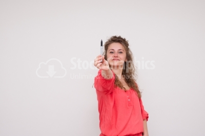 Young business woman writing or drawing something on screen or t
