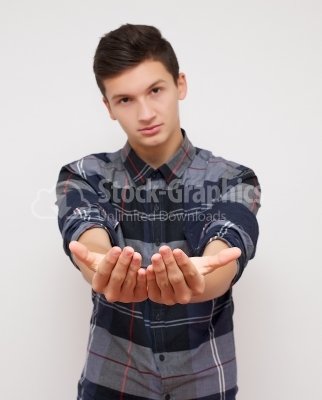 Young man holding something