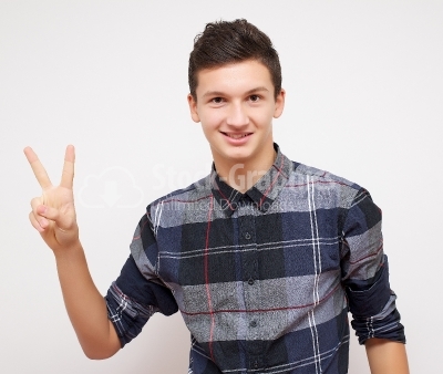 Young man showing 2 fingers