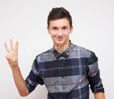Young man showing 3 fingers