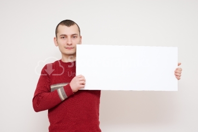 Young man with blank board isolated on white