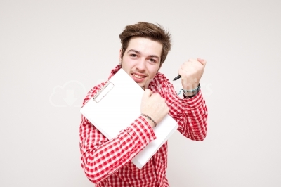 Young man with red shirt and blank board isolated on white