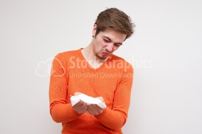Young manwith a handkerchief on white background