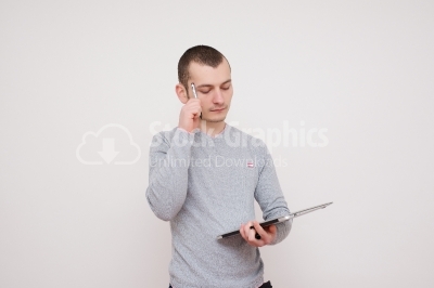 Young thoughtful man isolated over white background